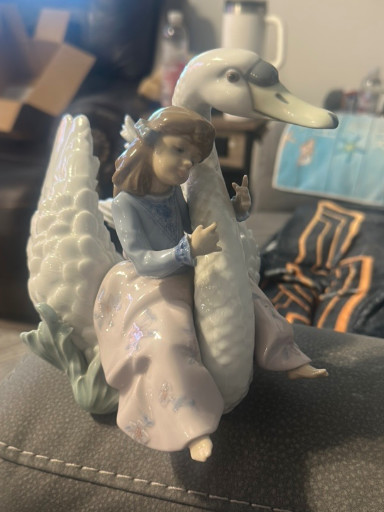 Porcelain figurine titled 'Swan Song' by Lladró