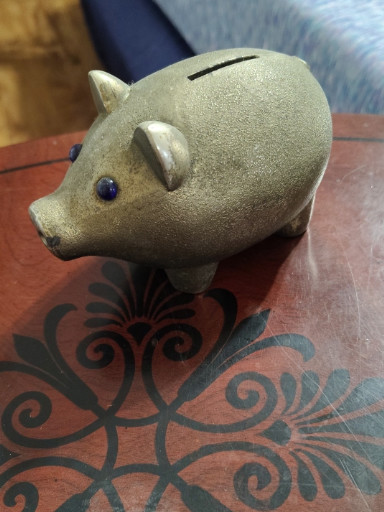 Ceramic or pottery piggy bank with textured glaze finish