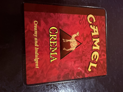 Metal cigarette tin for Camel Crema by R.J. Reynolds Tobacco Company