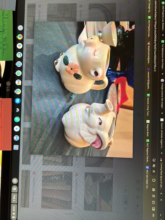 Ceramic creamers featuring Smiley Pig and Elephant characters by Shawnee Pottery