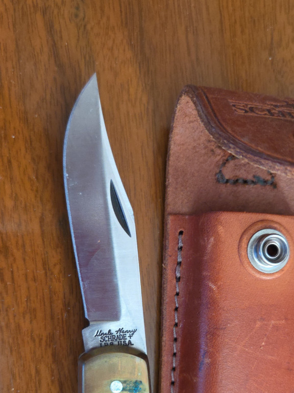 Folding pocket knife 'Uncle Henry' by Schrade with leather sheath