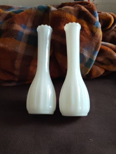 Pair of vintage white milk glass bud vases with fluted bodies and scalloped rims