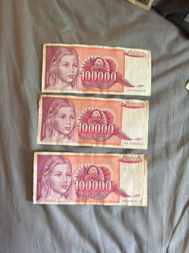 Three 100,000 Dinara banknotes from the Socialist Federal Republic of Yugoslavia