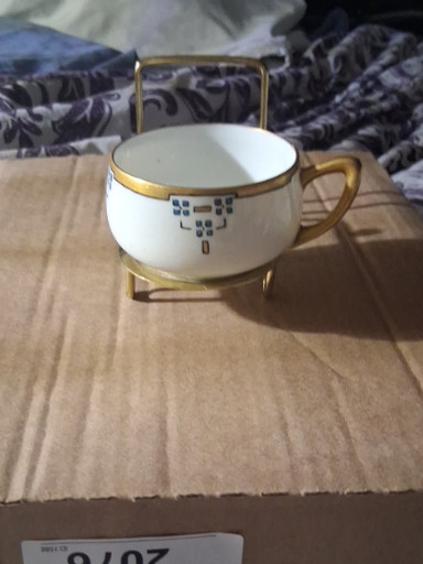 Porcelain footed cup with hand-painted geometric decoration and gold trim, likely Austrian or Bavarian origin
