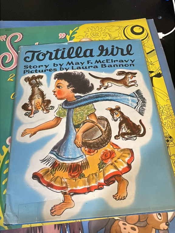 Children's book titled 'Tortilla Girl' by May F. McElravy with illustrations by Laura Bannon