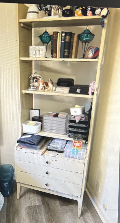 Distressed white painted wooden etagere bookcase with drawers