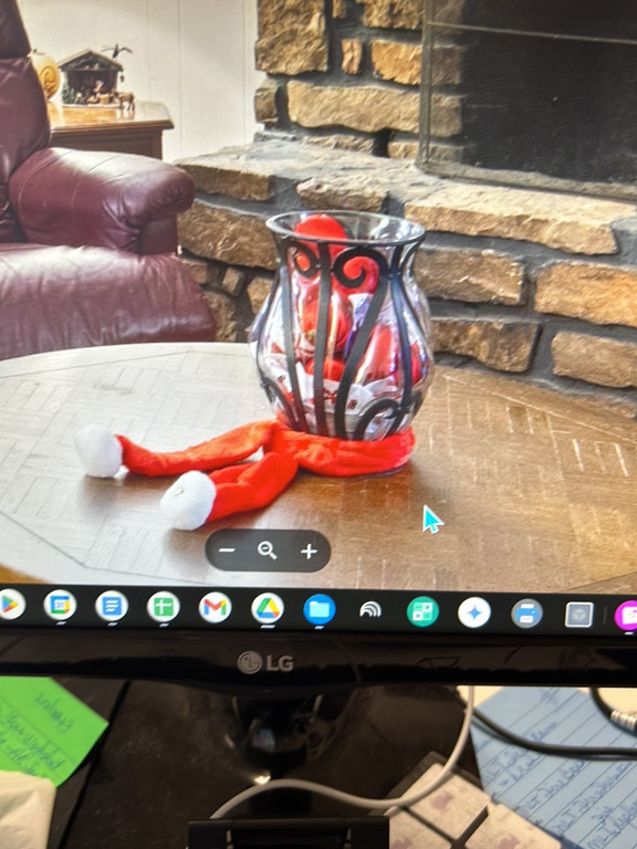 Glass vase with wrought iron decorative elements