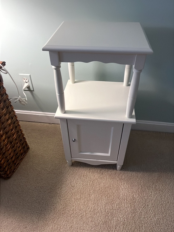 White painted wood accent table with storage cabinet