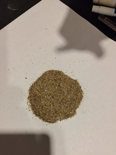 This is gold flakes with many other fine materials and minerals ...