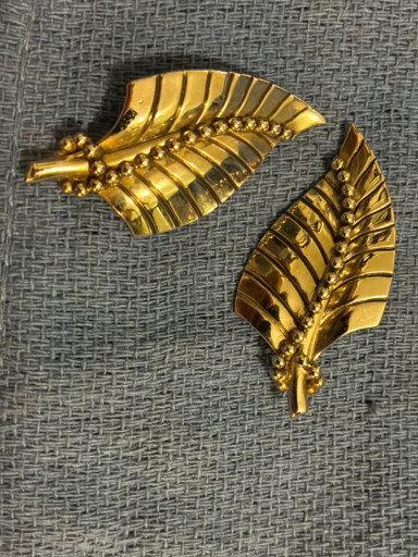 Gold-tone metal leaf clip-on earrings by Lisner