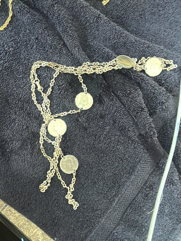 Gold-tone metal chain necklace with coin medallions