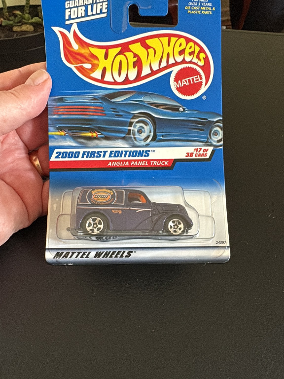 Hot Wheels die-cast toy car 'Anglia Panel Truck' by Mattel