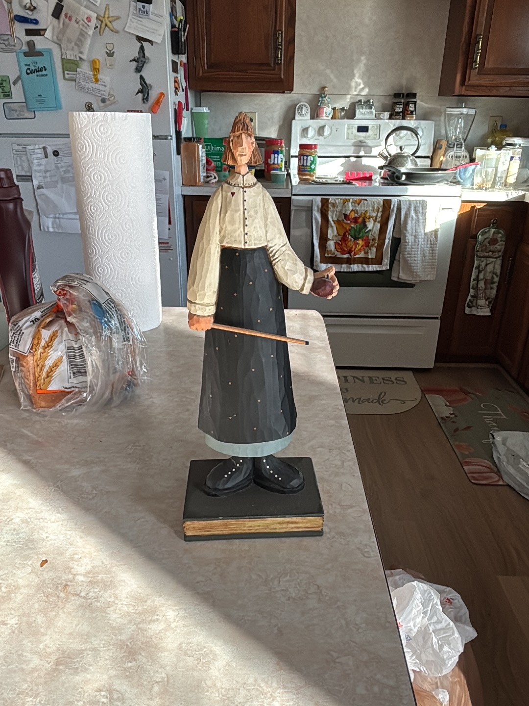 Wooden folk art figurine titled 'Miss Sternberg' by Williraye Studio