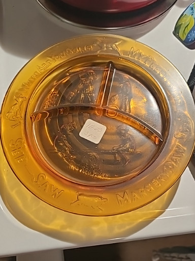 Amber glass divided dish with nursery rhyme motif featuring 'Hey Diddle Diddle'