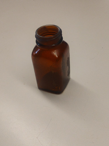 Vintage amber glass medicine bottle