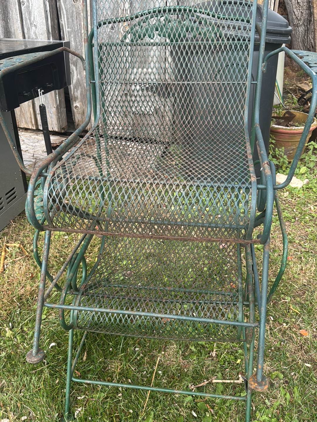 Vintage wrought iron spring rocking chairs have set of four make an offer selling two  for &200 all four 350..one arm missing on one