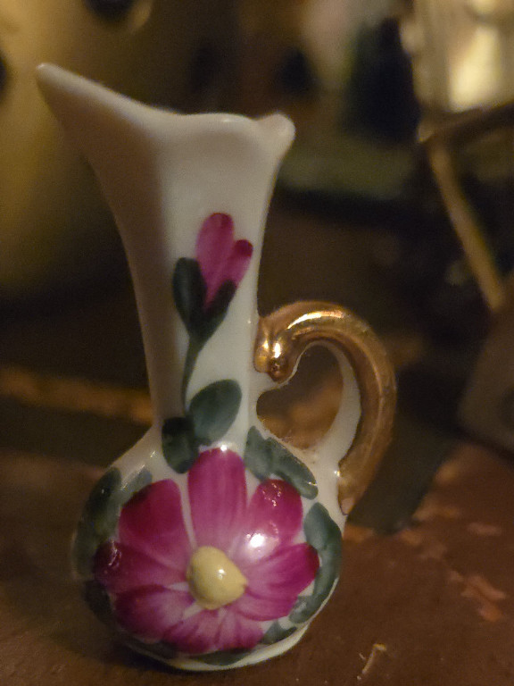 Porcelain miniature pitcher with hand-painted floral design by Enesco