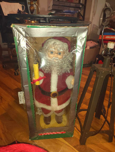 Animated and illuminated Santa Claus figure by Trim A Home
