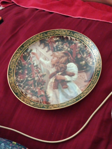 Porcelain collector plate titled 'Night Before Christmas' by Sandra Kuck from the Victorian Christmas Collection