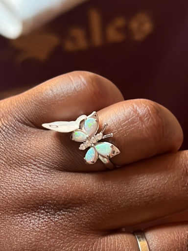Sterling silver butterfly ring with white opal cabochons