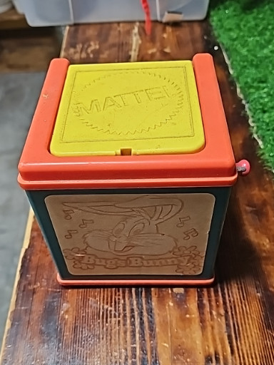 Metal jack-in-the-box toy titled 'Bugs Bunny Jack in the Box' by Mattel