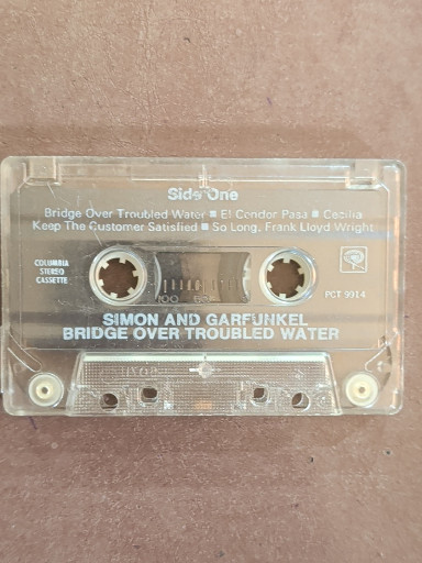 Audio cassette tape of 'Bridge Over Troubled Water' by Simon and Garfunkel with case and insert
