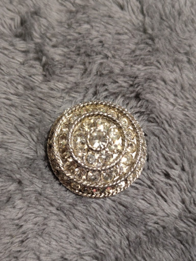 Silver-toned metal button with clear rhinestones in concentric circular design