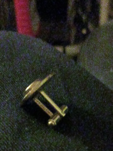 Gold-tone cufflinks with faux mother-of-pearl or abalone insets