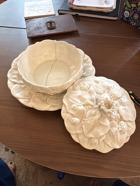 Ceramic bowl and lid with floral relief decoration