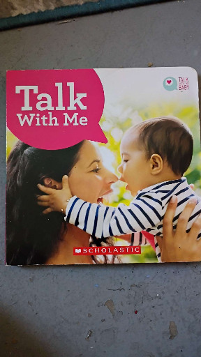 Children's board book titled 'Talk With Me' published by Scholastic