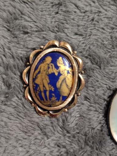 Vintage porcelain cameo brooch with cobalt blue background and gold courting couple scene, made in Germany