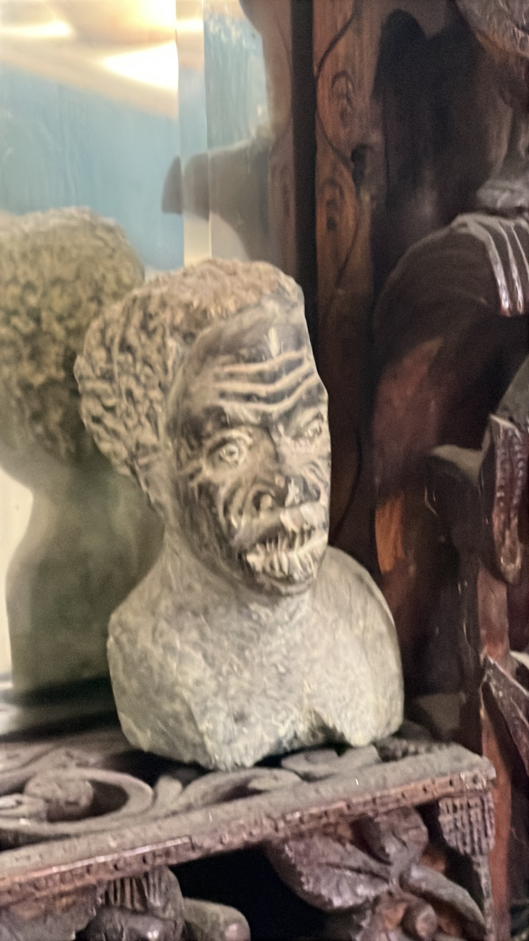 Stone sculpture bust of a tribal figure
