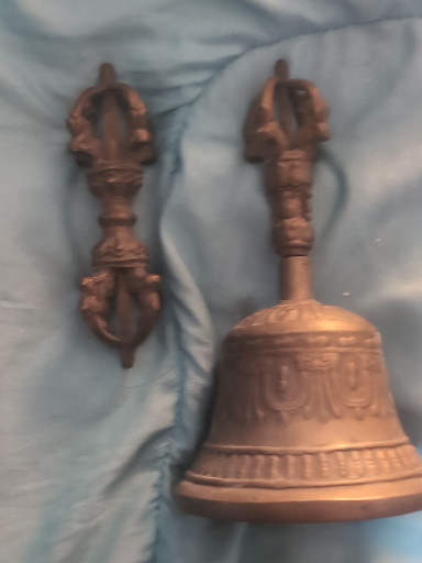 Bronze Tibetan Buddhist ritual bell (ghanta) with vajra handle and matching vajra (dorje)