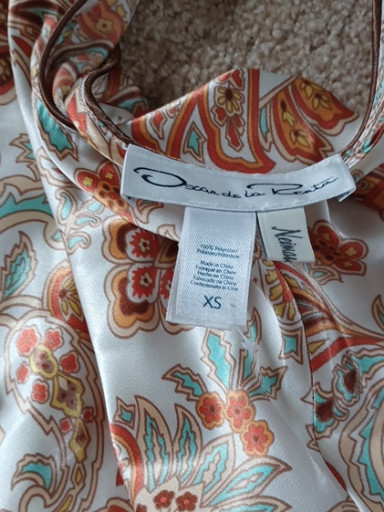 Silk blouse with paisley print by Oscar de la Renta