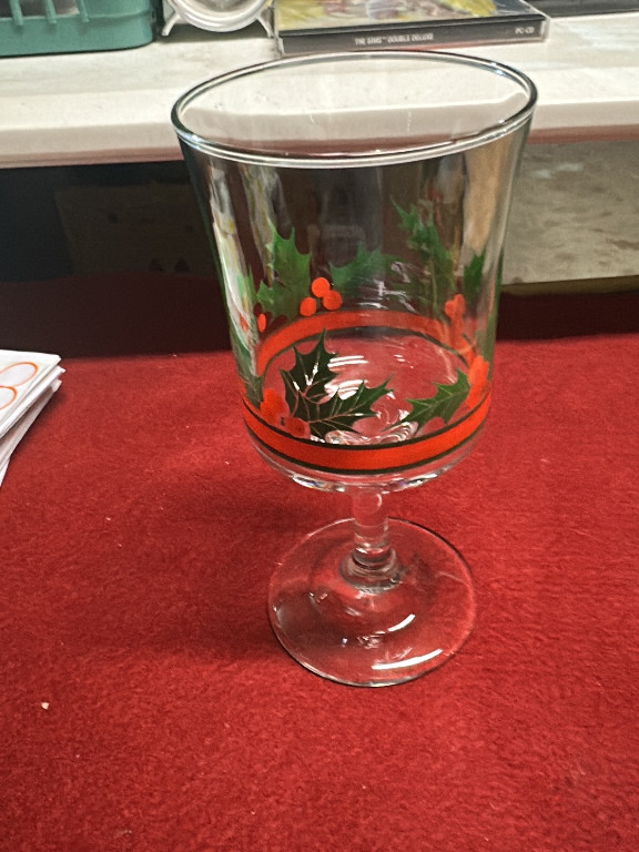 Glass goblet with holly and berry Christmas design by Libbey