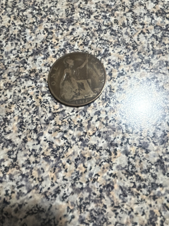 Bronze one penny coin from Great Britain featuring Britannia