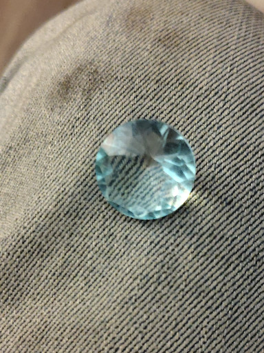 Natural aquamarine gemstone, round faceted cut