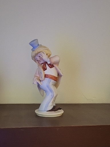 Porcelain figurine titled 'Oops!' by Goebel, from the 'Under the Big Top' series