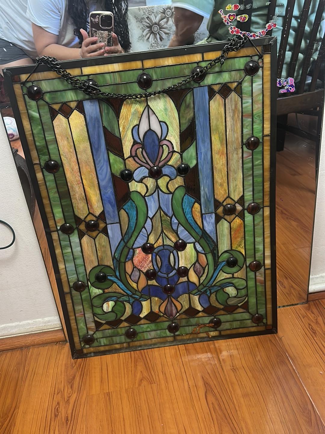 Stained glass window panel in Victorian style with floral motifs
