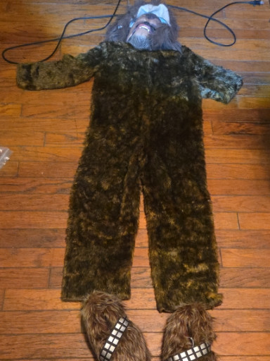 Star Wars Chewbacca costume with furry brown bodysuit and character slippers