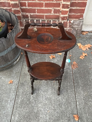 Mahogany corner washstand with gallery rail and lower shelf