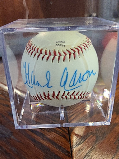 Official National League baseball signed by Hank Aaron