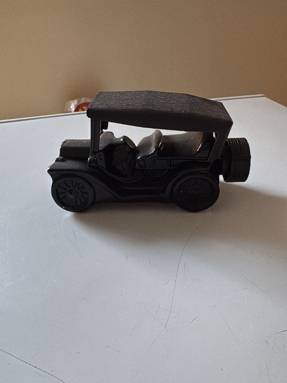 Black glass decanter shaped as vintage touring car by Avon