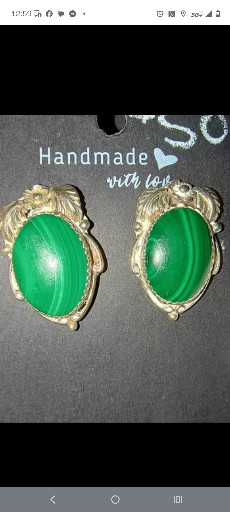 Sterling silver earrings with malachite cabochons in twisted rope settings