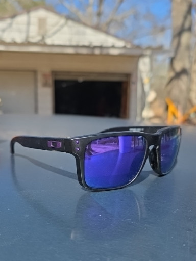 Oakley Holbrook sunglasses with matte black frame and Violet Iridium lenses