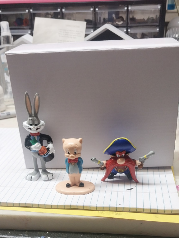Looney Tunes PVC figurines featuring Bugs Bunny, Porky Pig, and Yosemite Sam