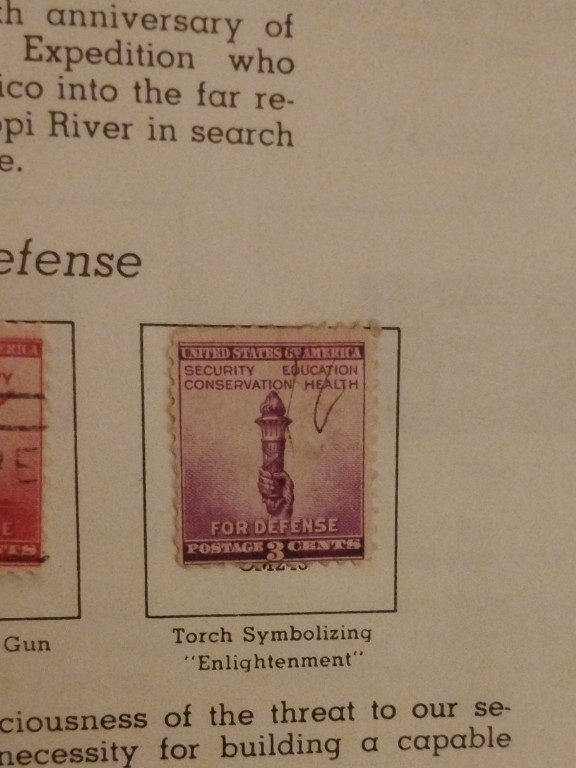 United States 3-cent postage stamp titled 'For Defense' featuring the Torch of Enlightenment