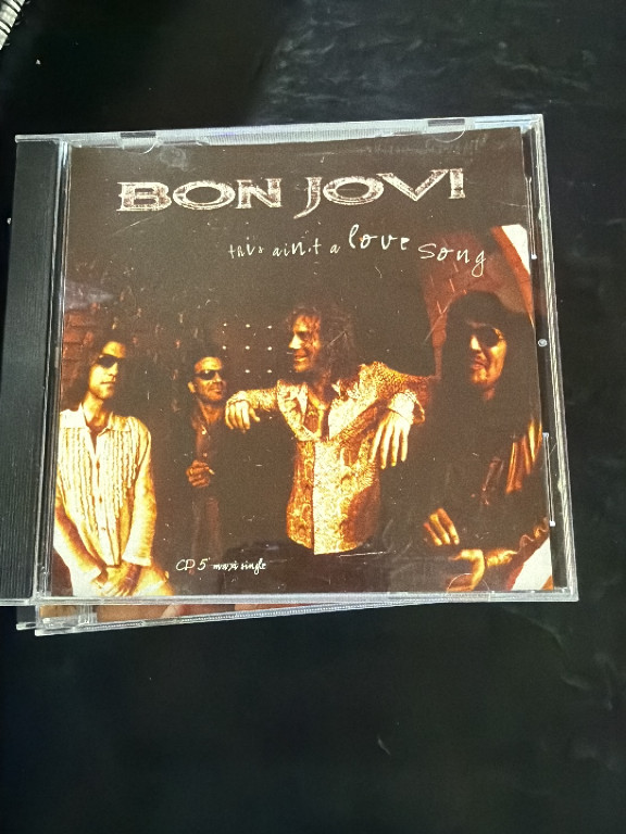 CD maxi-single titled 'This Ain't a Love Song' by Bon Jovi