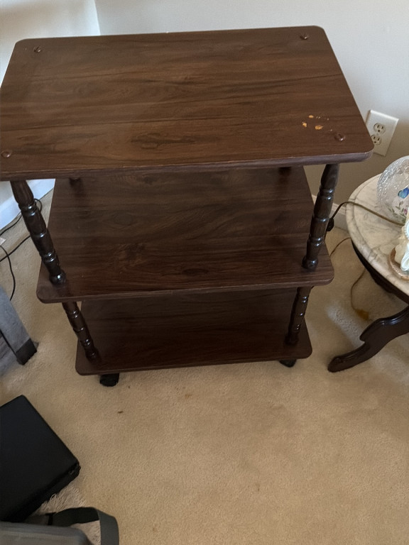 Wooden three-tier utility stand with spindle legs