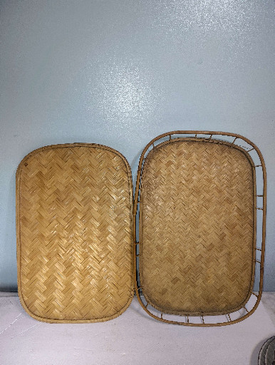 Pair of woven bamboo serving trays with rattan frames